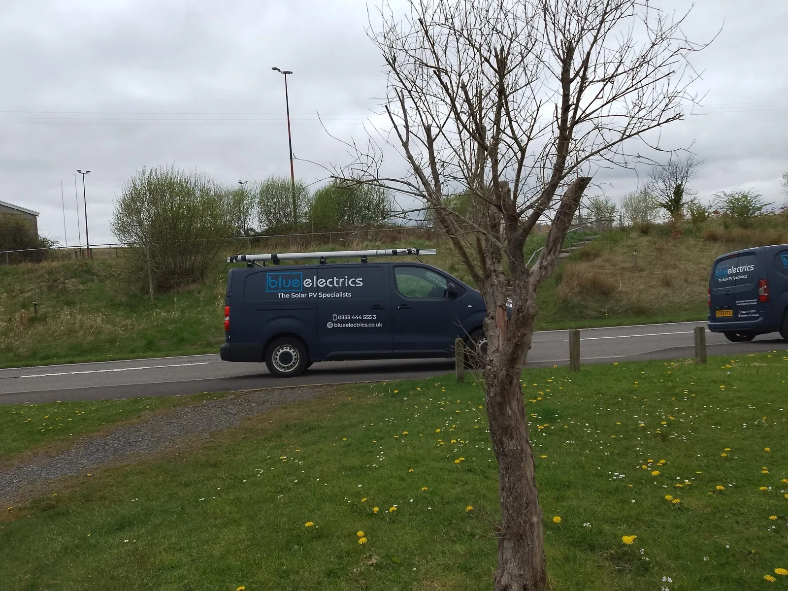 Blue Electrics vans on the road in South Wales — The Solar PV Specialists